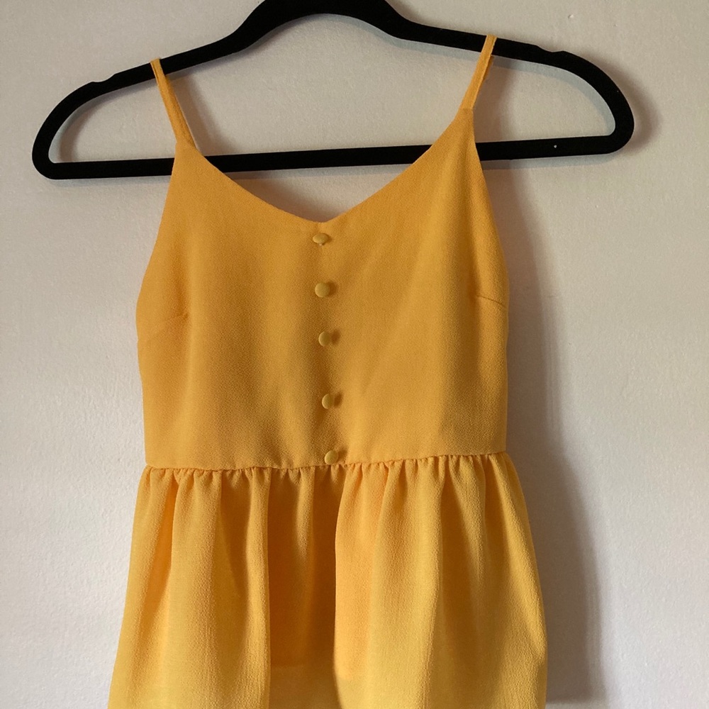 Yellow loose cropped blouse